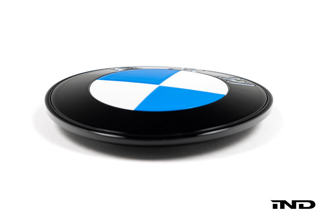 IND gloss black BMW iX3 NA5 Next Dark roundel set front and rear emblems on white background