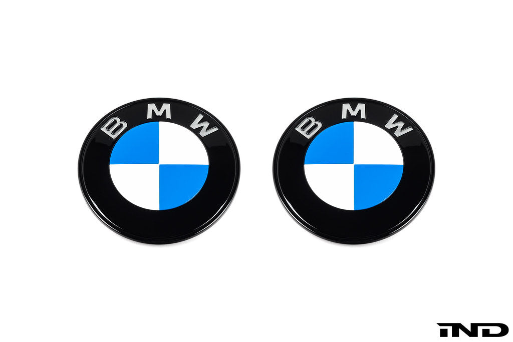 IND gloss black BMW iX3 NA5 Next Dark roundel set front and rear emblems on white background