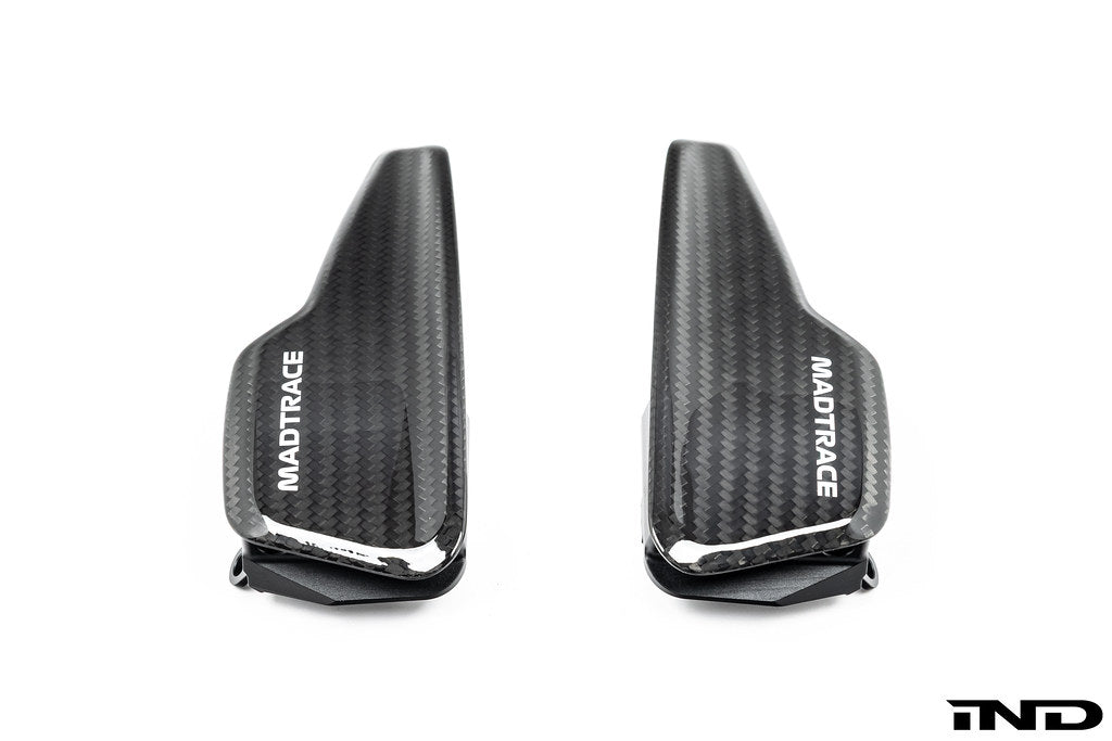 JQ Werks MadTrace C8 Corvette Clubsport magnetic shift paddle set installed inside a car with white background.