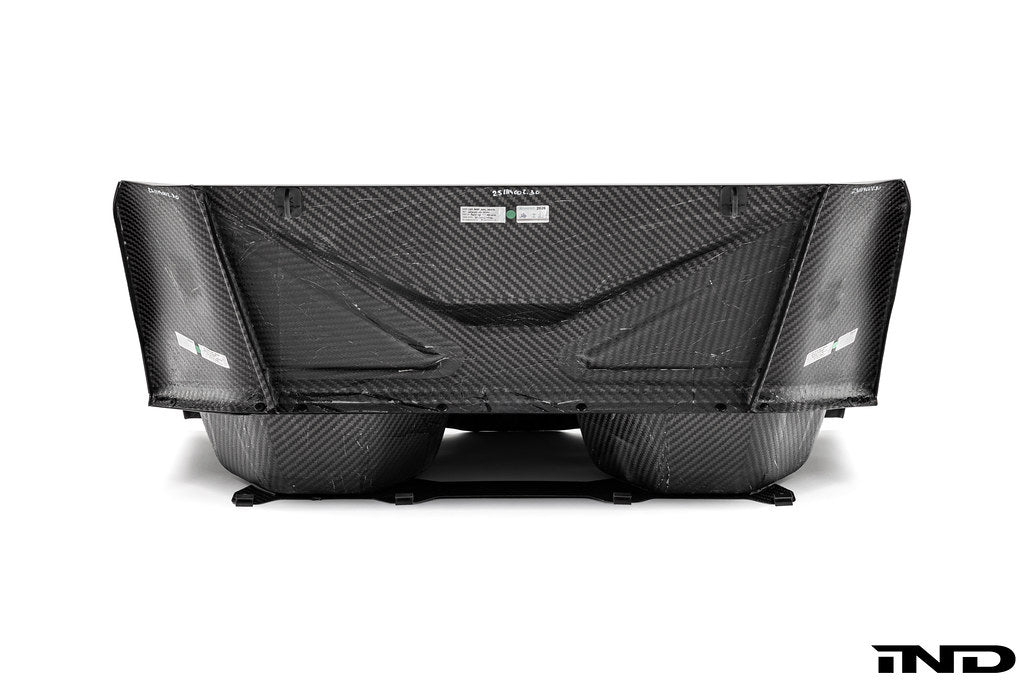 Karbonius carbon fiber rear seat delete closeout kit for BMW G87 M2 on a white background