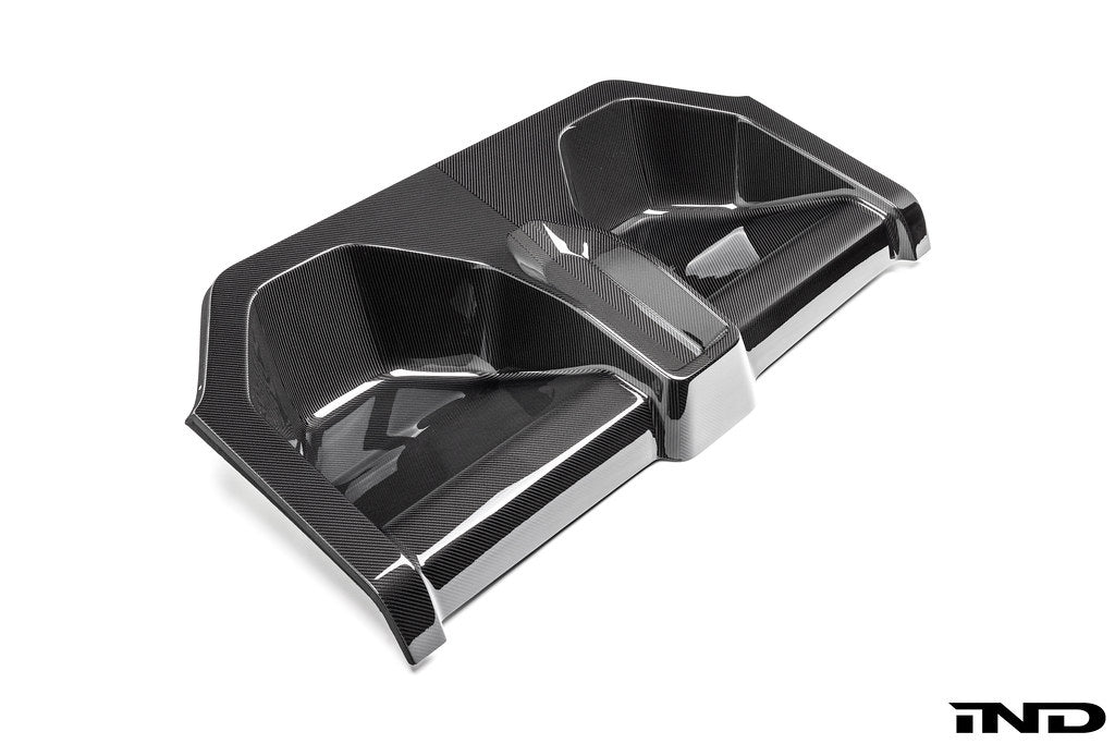 Karbonius carbon fiber rear seat delete closeout kit for BMW G87 M2 on a white background