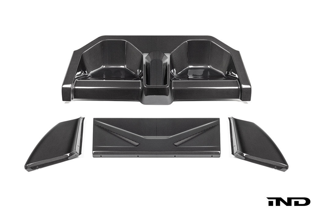 Karbonius carbon fiber rear seat delete closeout kit for BMW G87 M2 on a white background