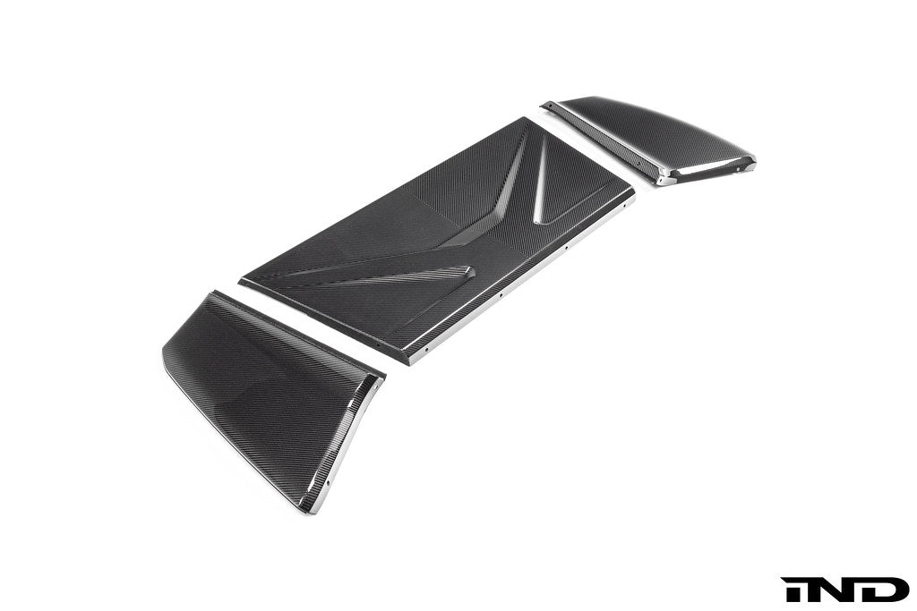 Karbonius carbon fiber rear seat delete closeout kit for BMW G87 M2 on a white background