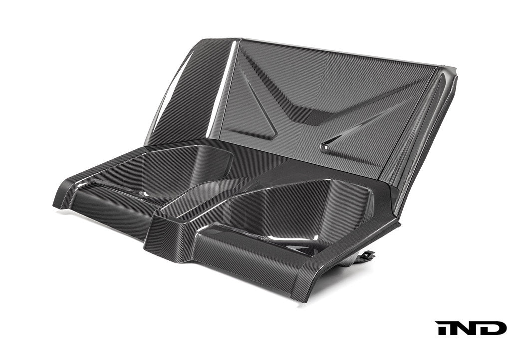 Karbonius carbon fiber rear seat delete closeout kit for BMW G87 M2 on a white background