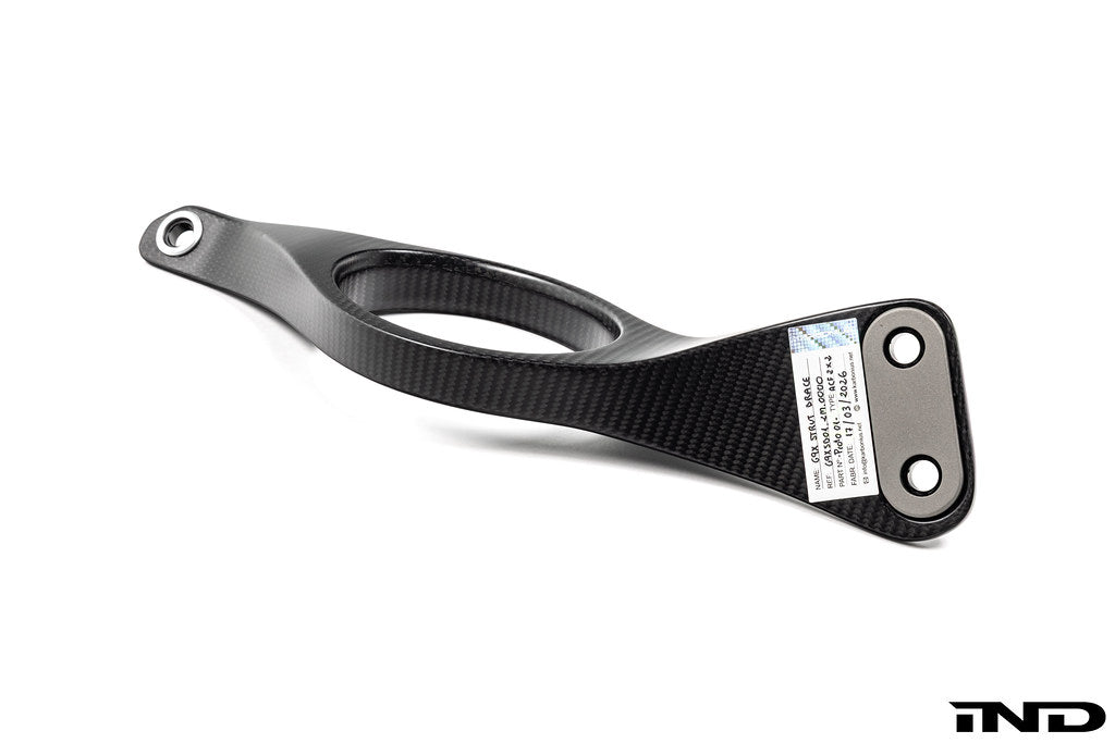 Karbonius G90 G99 M5 carbon fiber suspension strut brace set on white background, showcasing lightweight, high-performance automotive upgrade.