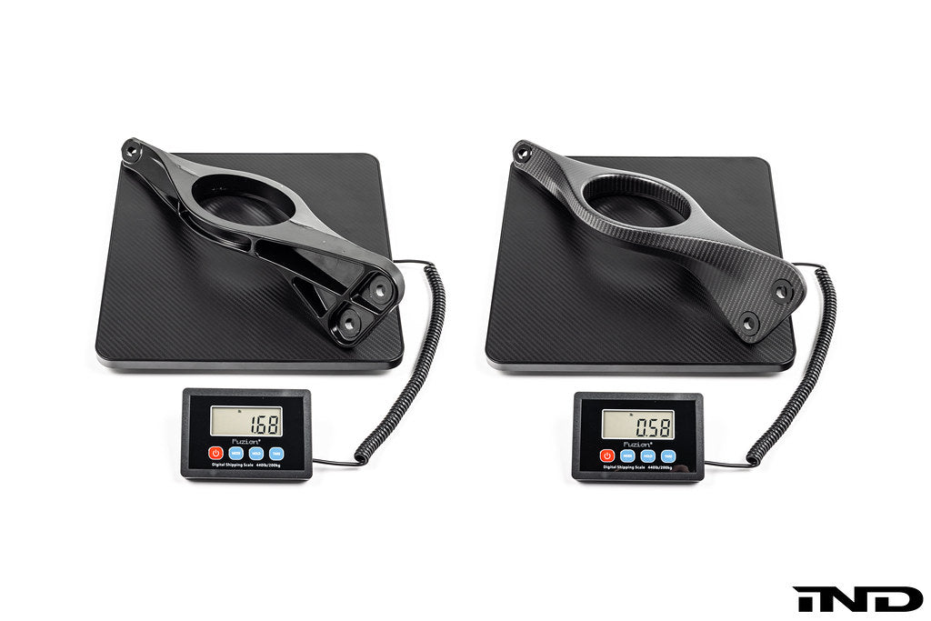 Karbonius G90 G99 M5 carbon fiber strut brace set for suspension, displayed on white background, lightweight and durable automotive upgrade