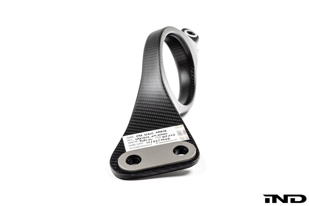 Karbonius G90 G99 M5 carbon fiber suspension strut brace set on white background, showcasing lightweight, high-performance automotive parts.