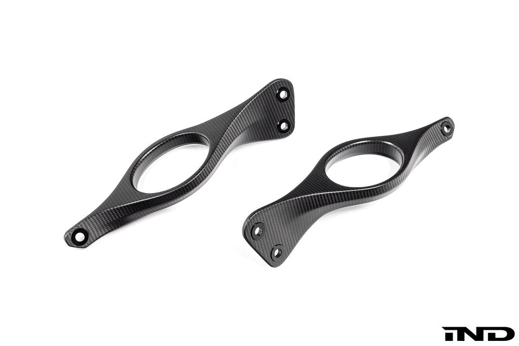 Karbonius G90 G99 M5 carbon fiber suspension strut brace set with white background, showcasing lightweight, aerodynamic design.