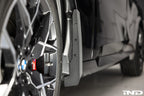 Megachip G45 X3 splash guard set installed on BMW X3 exterior with factory bodyline fitment for protection and style.