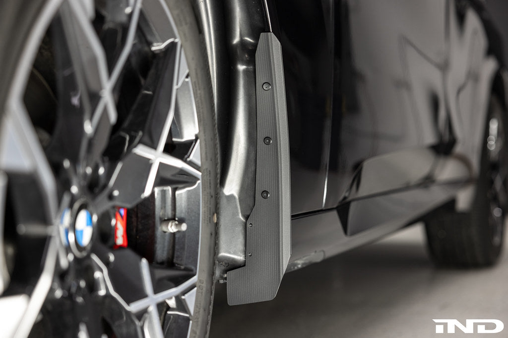 Megachip G45 X3 splash guard set installed on BMW X3 exterior with factory bodyline fitment