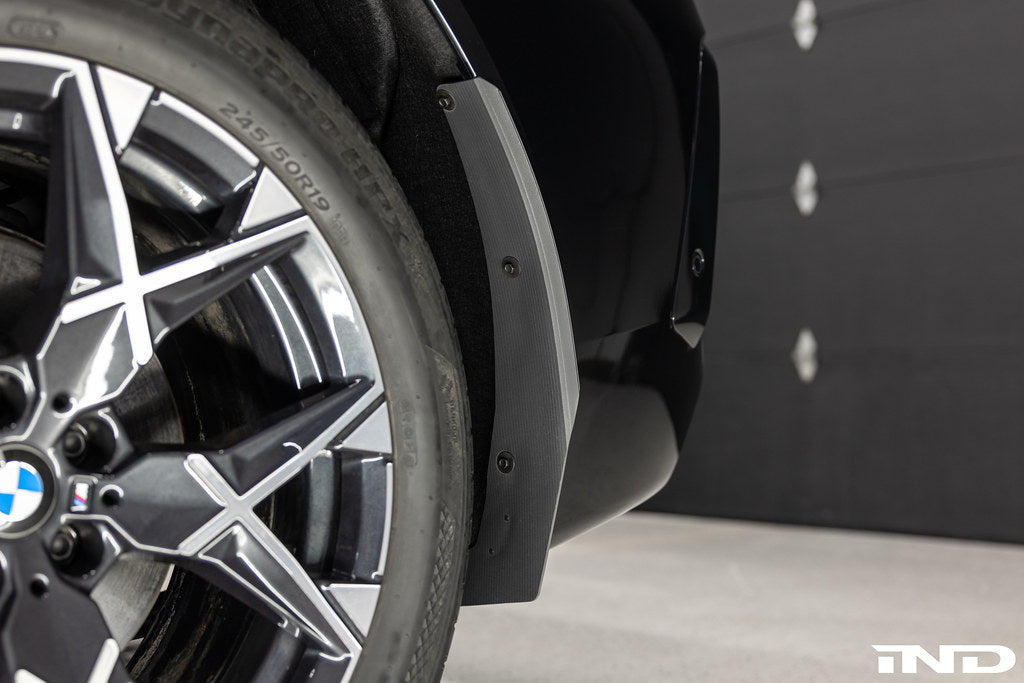 Megachip G45 X3 splash guard set installed on BMW G45 X3 exterior with factory bodyline fitment