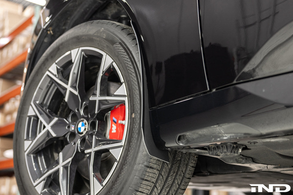 Megachip G45 X3 splash guard set installed on a BMW G45 X3, exterior factory bodyline fitment for vehicle protection.