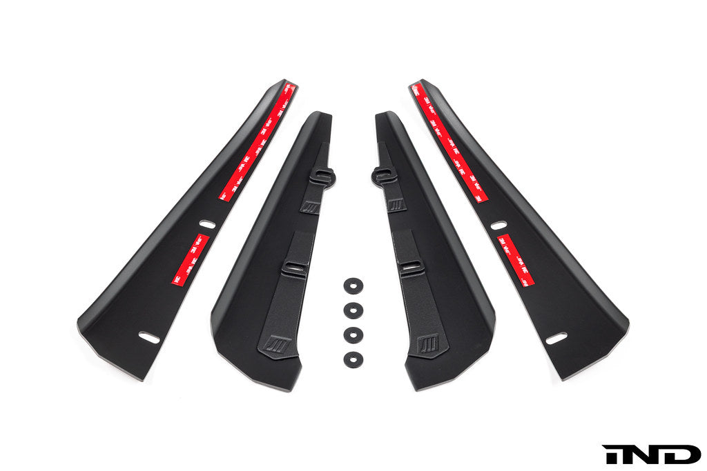 Megachip MK8 GTI and Golf R splash guard set installed on car with white background, showing durable exterior wheel splash protection.