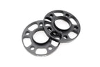 MMX Performance BMW / Supra 5x112 wheel spacer kit in black anodized finish with 12mm, 15mm, and 18mm spacers on wheels.