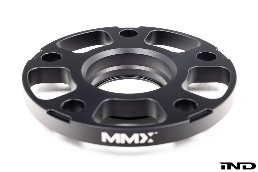 MMX Performance BMW and Supra 5x112 wheel spacer kit in black anodized finish with 12mm, 15mm, and 18mm spacers.