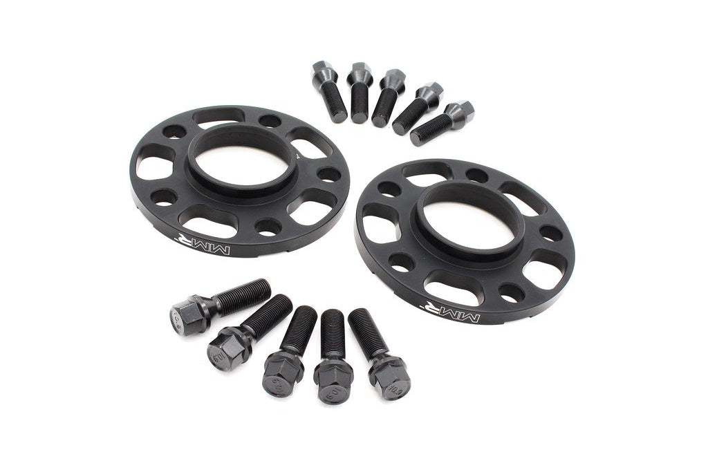 MMX Performance black anodized BMW and Supra 5x112 wheel spacer kit with 12mm, 15mm, and 18mm spacers for improved fitment.