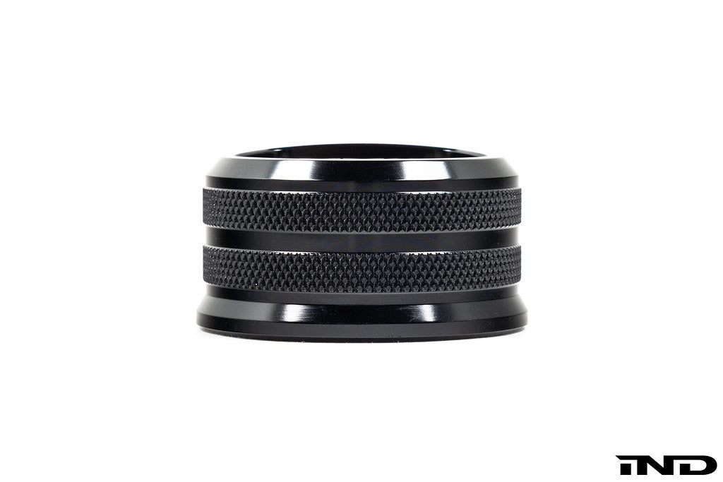 Black anodized MMX Performance BMW billet coolant expansion cap, 60mm, designed for high-performance cooling systems.