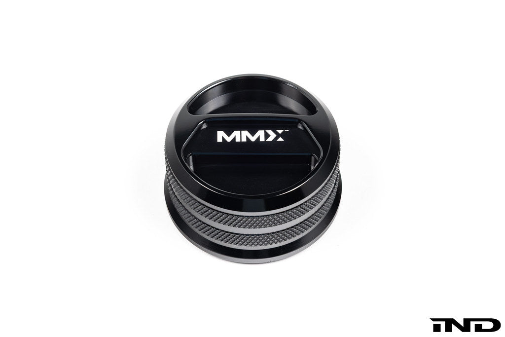 Black anodized MMX Performance BMW billet coolant expansion cap, 60mm, with a sleek, durable design for engine cooling system.
