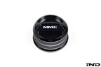Black anodized MMX Performance BMW billet coolant expansion cap, 60mm, with a sleek, durable design for engine cooling system.
