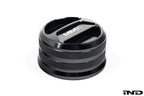 Black anodized MMX Performance BMW billet coolant expansion cap, 60mm, designed for high-performance cooling systems.