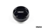 MMX Performance BMW billet coolant expansion cap, black anodized finish, 90mm diameter, designed for high-performance cooling systems.