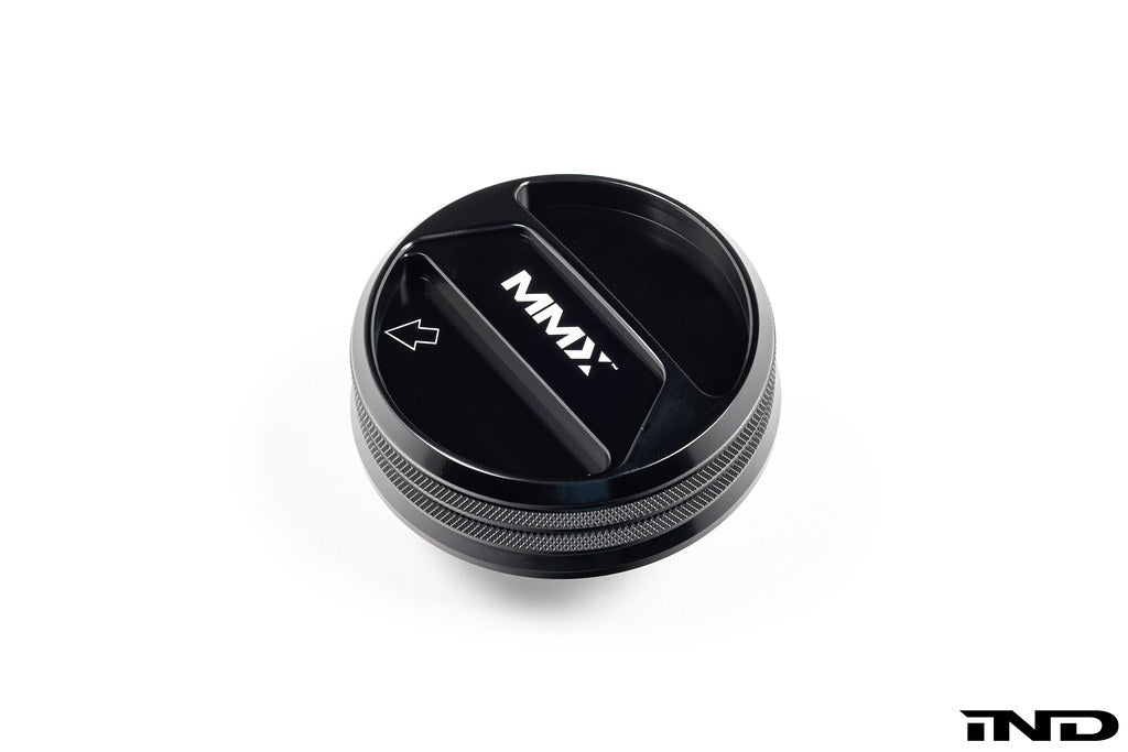 Black anodized MMX Performance BMW billet coolant expansion cap with a 90mm diameter, designed for high-performance cooling systems.
