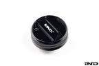 Black anodized MMX Performance BMW billet coolant expansion cap with a 90mm diameter, designed for high-performance cooling systems.