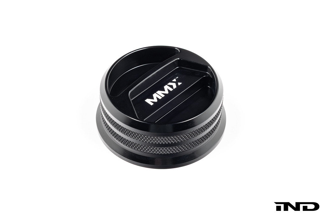 Black anodized MMX Performance BMW billet oil filler cap with sleek design on white background.