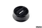 Black anodized MMX Performance BMW billet oil filler cap with sleek design on white background.