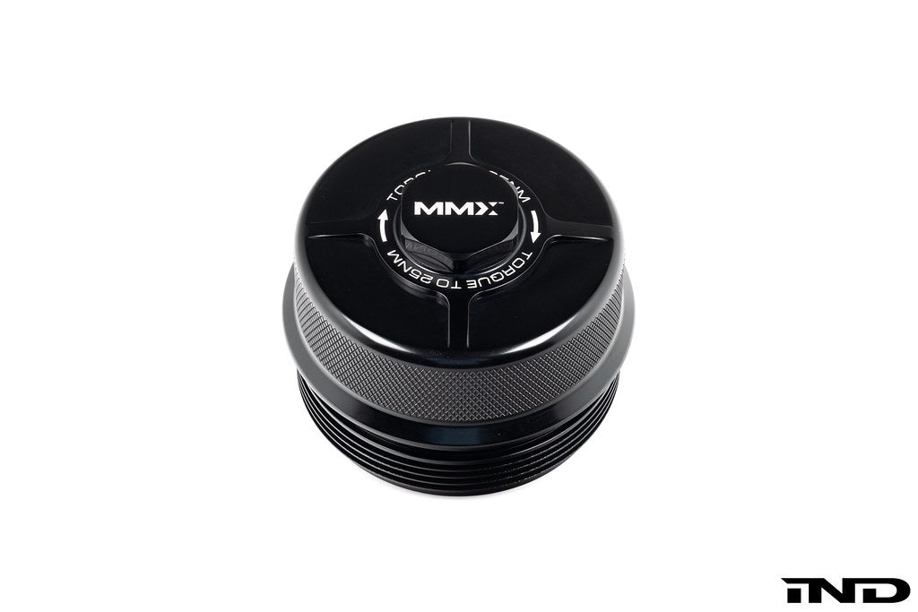 MMX Performance black anodized billet oil filter housing cap for BMW N20, N55, S55 engines, exterior view.