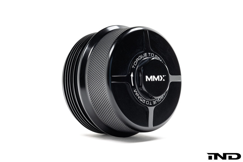 MMX BMW billet oil filter housing cap N20 N52 N54 N55 S55 black anodized aluminum replacement cap on white background