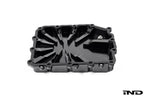 Black anodized billet aluminum BMW DCT oil pan by MMX Performance, designed for high-performance transmission oil containment.