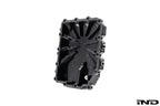 Black anodized billet aluminum BMW DCT oil pan by MMX Performance, designed for high-performance transmission cooling.