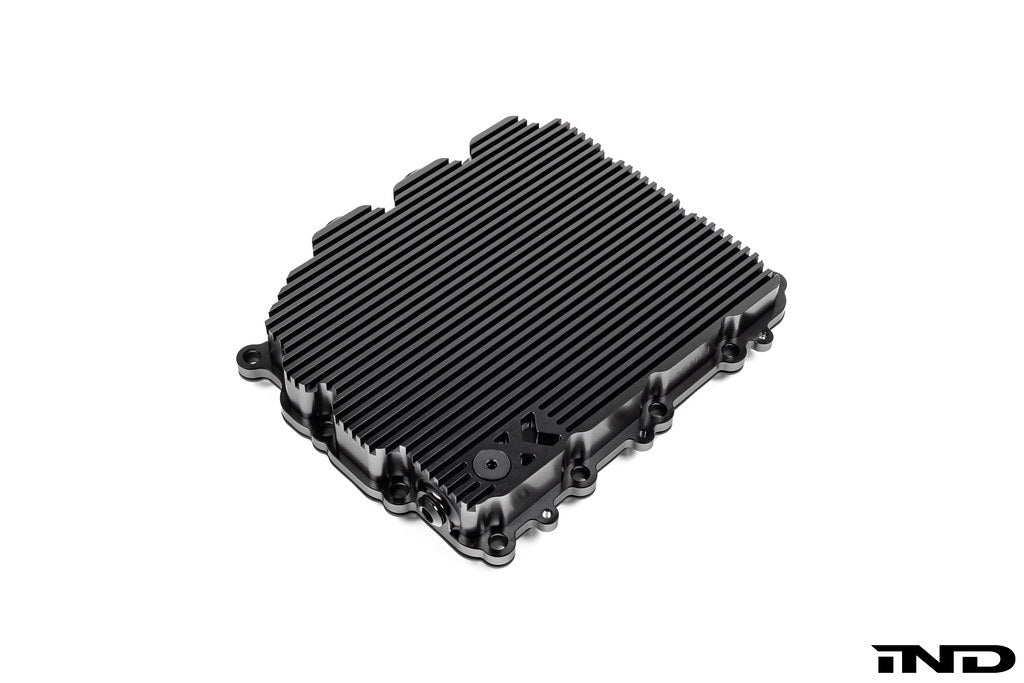 MMX Performance aluminum BMW DCT oil pan with black anodized finish, billet construction, designed for high-performance transmission cooling.
