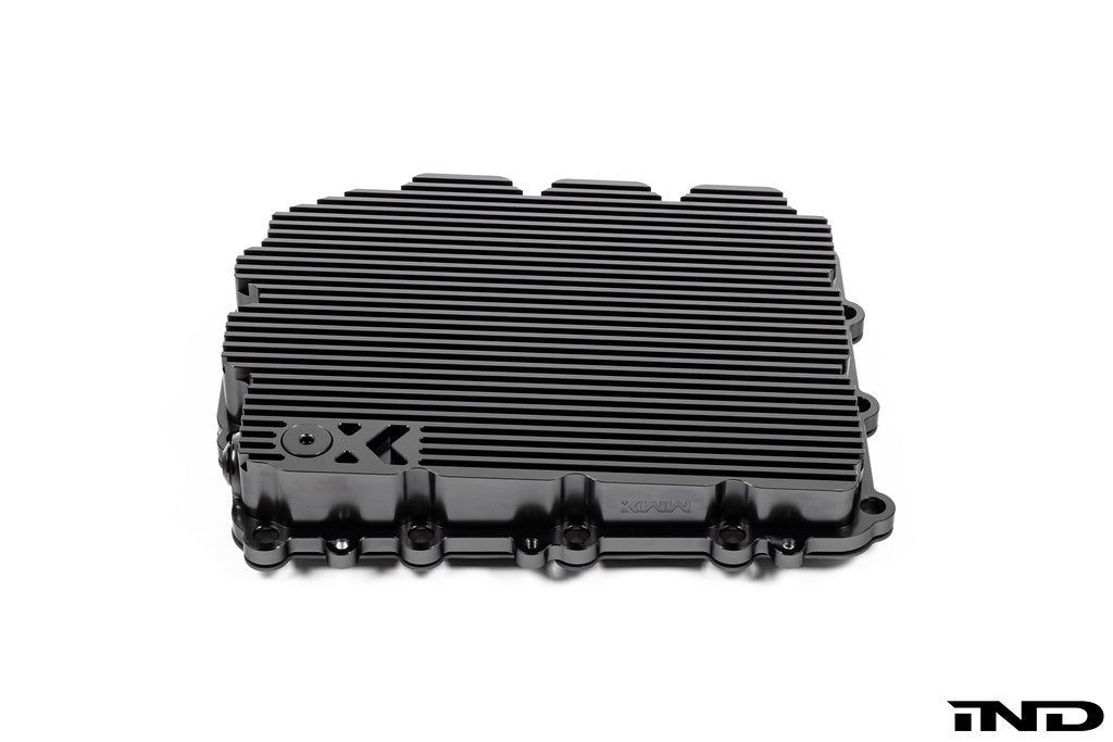 Black anodized aluminum BMW DCT oil pan by MMX Performance, designed for high-performance DCT transmissions.