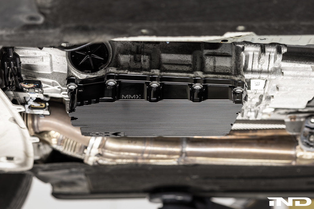 Black anodized MMX Performance Aluminum BMW DCT Oil Pan installed, showcasing durable construction and precise fit for BMW vehicles.