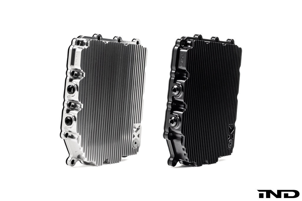 MMX Performance aluminum BMW DCT oil pan with clear anodized finish, billet design, on black background.