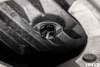 MMX Performance magnetic oil sump drain plug M12x1.5 installed on a vehicle for secure oil drainage and magnetic debris collection.