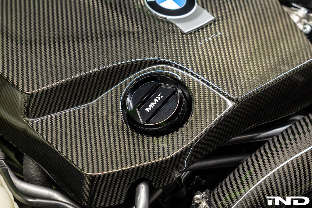 BMW with MMX Performance billet oil filler cap installed, showcasing a sleek, durable performance engine upgrade.