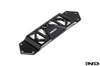 MMX Performance BMW F8X Underbody Chassis Brace on a white background, precision CNC machined from billet 6061-T6 aluminum to increase exhaust clearance, improve chassis rigidity, and provide a direct OEM-fit installation for the F87 M2, M2 Competition, F80 M3, and F82/F83 M4.