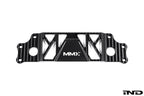 MMX Performance BMW G87 M2 Underbody Chassis Brace on a white background, precision CNC machined from billet 6061-T6 aluminum to provide additional exhaust clearance, increased chassis rigidity, and direct OEM-fit installation.