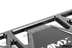 MMX Performance BMW G87 M2 Underbody Chassis Brace on a white background, precision CNC machined from billet 6061-T6 aluminum to provide additional exhaust clearance, increased chassis rigidity, and direct OEM-fit installation.