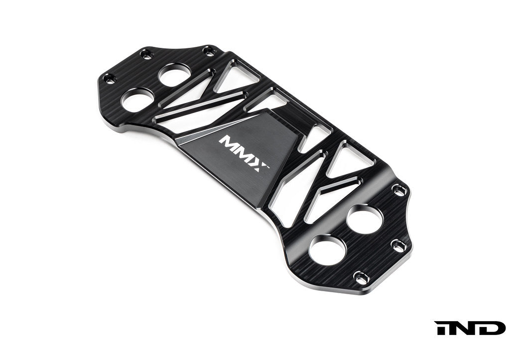 MMX Performance BMW G8X M3 and M4 billet 6061-T6 aluminum underbody chassis brace on a white background, designed to increase exhaust clearance and improve chassis rigidity for G80, G81, G82, and G83 models.