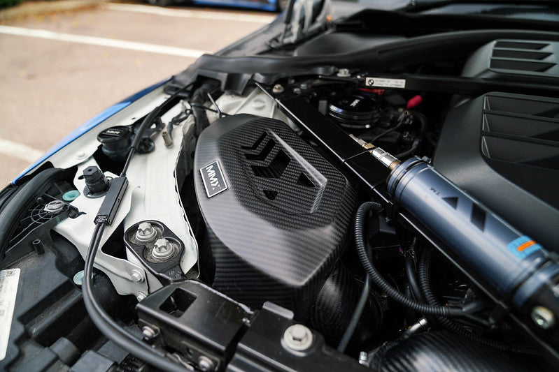 MMX Performance carbon fiber intake installed on BMW G8X S58 engine