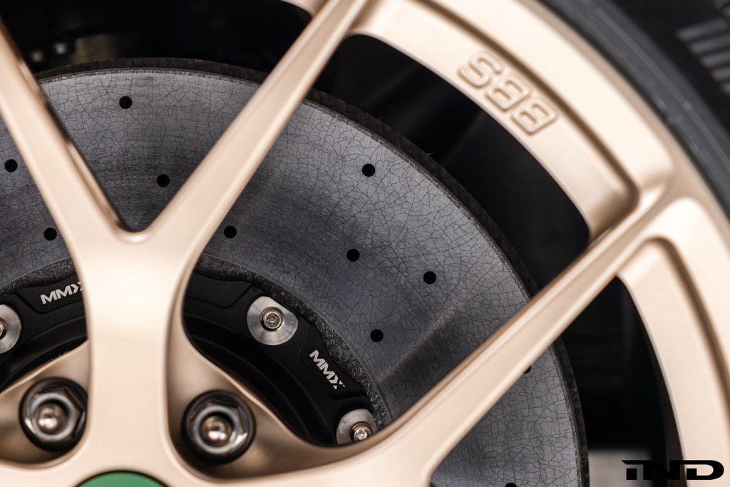 MMX Performance G8X M2/M3/M4 rear 370x24mm floating carbon ceramic brake rotor installed on vehicle.
