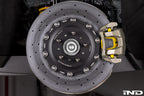 MMX Performance G8X rear 370x24mm carbon ceramic brake rotor installed on M2, M3, M4 models, showcasing high-performance brake components.