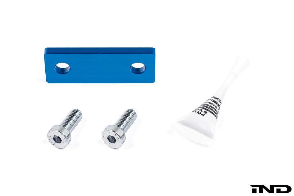 Rogue Engineering exhaust rear muffler hanger spacer kit for BMW E36, E46, E9X models, shown on white background.