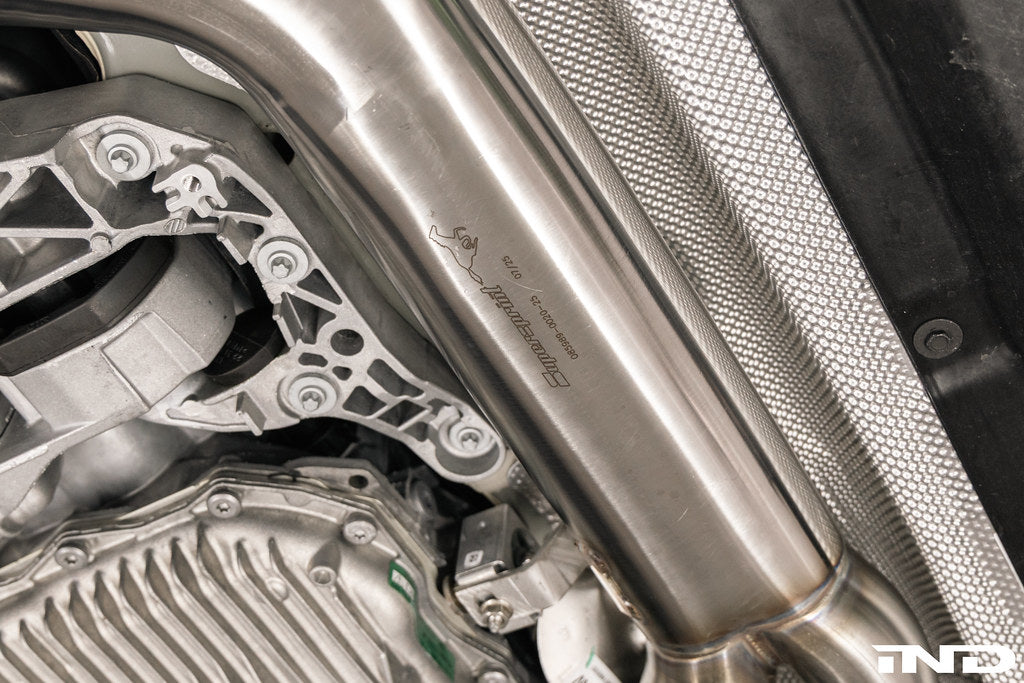 Supersprint BMW G8X M3 / M4 J-Pipe Resonator Delete Package installed with OEM rear muffler on BMW G80 M3 and G82 M4