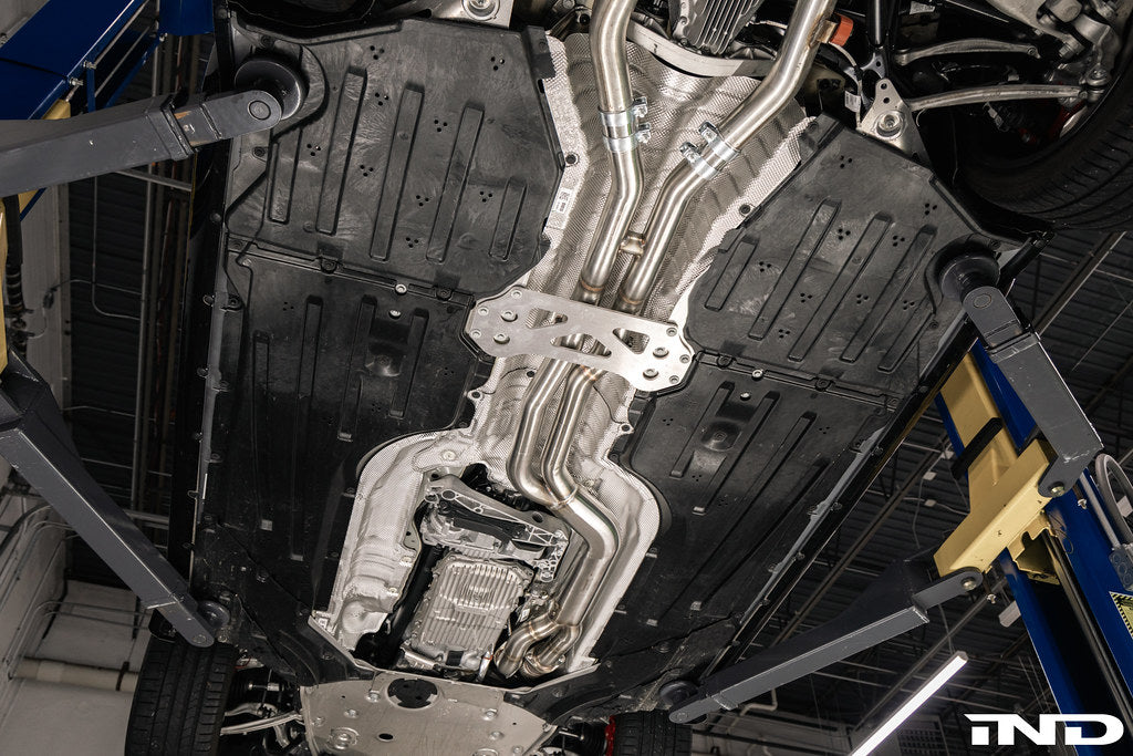 Supersprint BMW G8X M3 / M4 J-Pipe Resonator Delete Package installed with OEM rear muffler on BMW G80 M3 and G82 M4