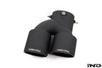 TREVORA G42 G2X 3 and 4 Series Cerakote black exhaust tip set mounted on car exhaust pipe, with a white background.